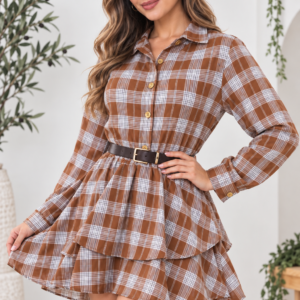 Model wearing a brown and cream plaid belted ruffle mini dress with long sleeves